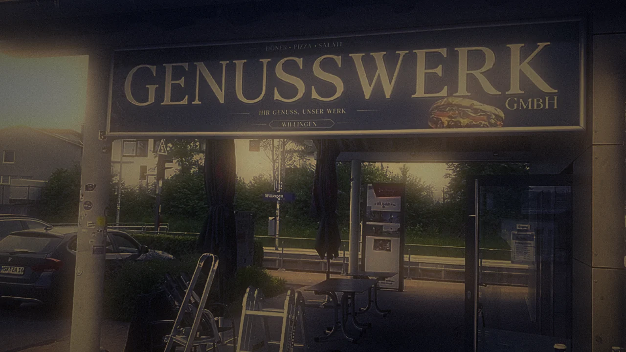 Genusswerk – Schild bei Nacht